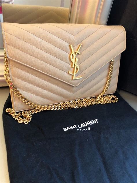 yves saint laurent beige clutch|authentic ysl handbag clutch.